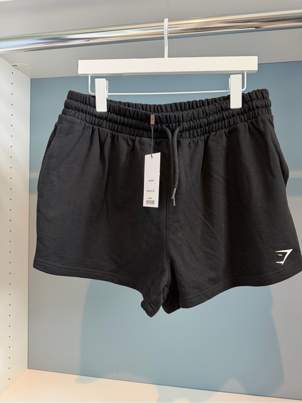 NWT Gymshark Women’s Black Graphic Shorts. Sz large. White logo detail. New!